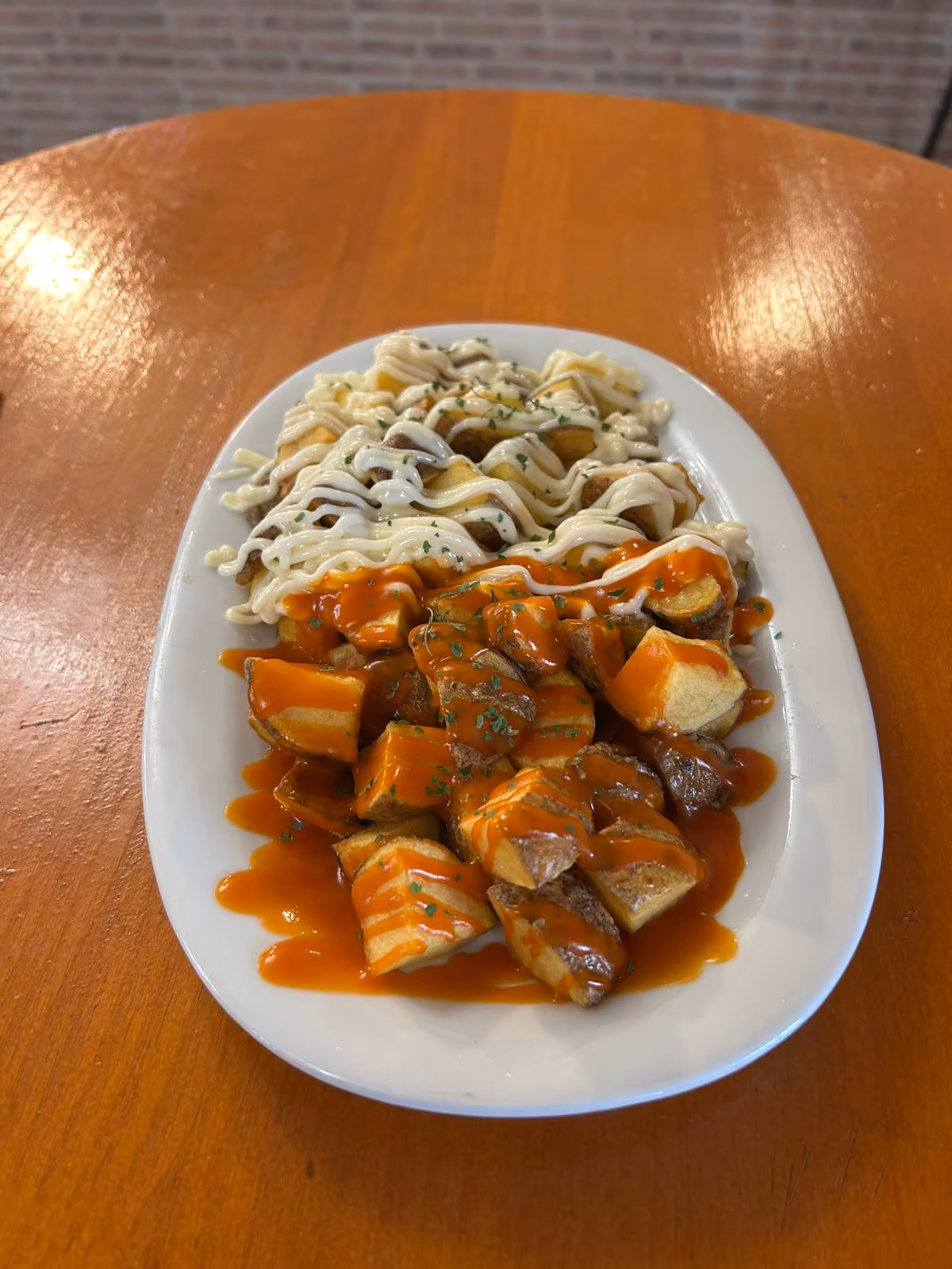 Patatas bravioli — Restaurante Don Quijote Estremera, Estremera (Madrid)